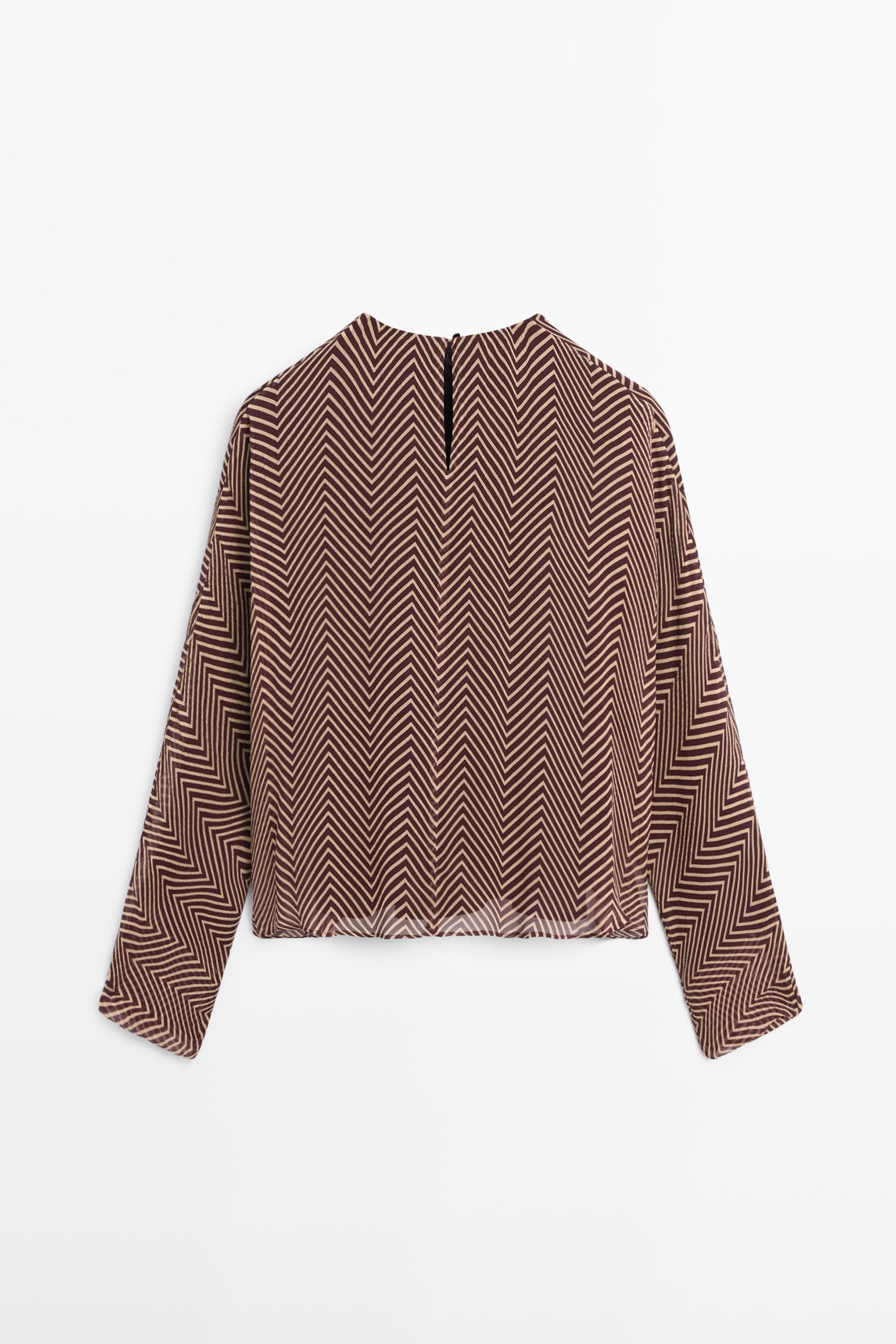 Flowing geometric print blouse